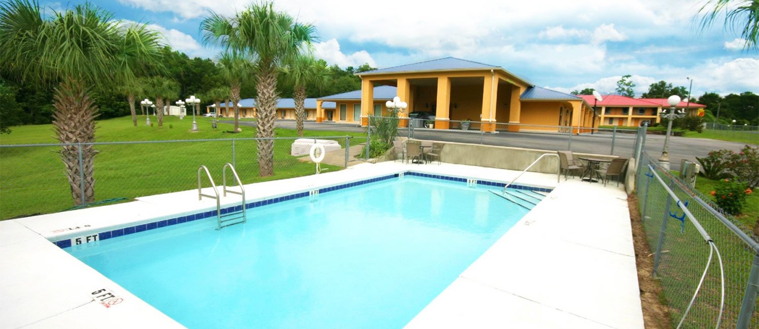 Soak Up The Florida Sun And Lounge By Our Pool